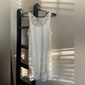 White dainty lace dress with white shirt dress underneath!